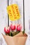Tulips on wooden background.