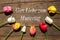 Tulips on wooden background and german text for motherÂ´s day