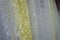 Tulle transparent fabric. It is used for windows. Background. White, yellow.