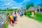 TULUM, MEXICO - JANUARY 10, 2018: Unidentified people walking and enjoying the view of Temple of the Frescoes at the