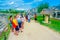 TULUM, MEXICO - JANUARY 10, 2018: Unidentified people walking and enjoying the view of Temple of the Frescoes at the