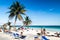 TULUM, MEXIO - FEB 29, 2016: Tourists enjoy the Caribbean beach in Tulum, Mexi