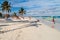 TULUM, MEXIO - FEB 29, 2016: Tourists enjoy the Caribbean beach in Tulum, Mexi