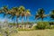 TULUM, MEXIO - FEB 29, 2016: Tourists visit the ruins of the ancient Maya city Tulum, Mexi