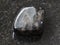 tumbled anthophyllite gemstone on dark