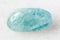 Tumbled Aquamarine blue Beryl rock on white