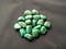 Tumbled aventurine stones for crystal therapy treatments and reiki detail isolated