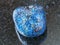 tumbled Azurite gemstone on dark background