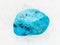 tumbled blue Agate gemstone on white marble