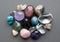 Tumbled gems of various colors. Amethyst, rose quartz, agate, apatite, aventurine, olivine, turquoise, aquamarine, rock crystal