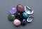 Tumbled gems of various colors. Amethyst, rose quartz, agate, apatite, aventurine, rock crystal