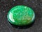 tumbled green Aventurine gem stone on black