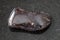 tumbled hydrogoethite gemstone on dark