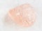 tumbled morganite (pink beryl) gemstone on white