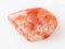 tumbled sunstone (heliolite) gemstone on white