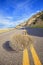 Tumbleweed on an empty road.