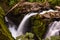 The tumbling waters at Sol Duc Falls, Olympic National Park, Washington, USA, long exposure to create a blurred motion to the