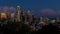 Tume lapse of clouds and night lights over cityscape of Seattle Washington from sunset to blue hour and night 4k uhd
