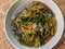 Tumis kangkung or stir fried water spinach, close up view