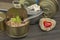 Tuna cans on a dark wooden table. Sales of canned fish. Diet food.