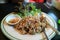 Tuna fried rice with fresh vegetables in the plate