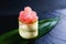 Tuna and philadelphia sushi roll on bamboo leaf