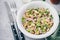 Tuna salad with celery, white beans, red onion and parsley