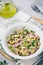 Tuna salad with celery, white beans, red onion and parsley