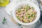 Tuna salad with celery, white beans, red onion and parsley