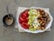 Tuna salad with crackers, tomatoes, cucumbers, boiled eggs