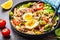 Tuna salad with pasta, olives, vegetables and egg in black plate