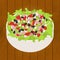 Tuna salad on wood background