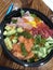 Tuna sashimi and salmon salad bowl,