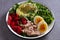 Tuna strawberries avocado egg and spinach salad. Tuna fish salad.