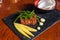 Tuna tataki - light grilled tuna in sesame seed coating served with citrus sauce and wasabi mayonnaise