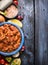 Tuna tomato sauce , ingredients on blue wooden background, top view,