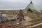 Tundra, The extreme north, Yamal, the pasture of Nenets people, children on vacation playing near reindeer pasture