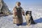 Tundra, open area, the boy with a dog in cold winter weather, the boy  in national clothes