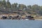 Tungabhadra river in the village of Hampi and the transfer of local residents and tourists to the other shore. Big stone. Tropical