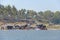 Tungabhadra river in the village of Hampi and the transfer of local residents and tourists to the other shore. Big stone. Tropical