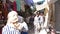 Tunis, Tunisia - 06 June 2018: Arabian women walking on local market Tourist people shopping souvenirs and gifts on arab