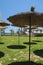 TUNISIA, YASMINE HAMMAMET - APRIL 27, 2019: the parasols of the hotel Lella Baya