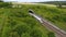 Tunnel entrance and railroad track - aerial view, drone footage