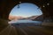 Tunnel exit overlooking Lake Potrerillos at dawn, in Mendoza, Argentina