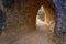 Tunnel formed in the stone rock eroded by time in the Enchanted City