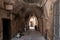 The tunnel lined with stones passes under buildings in the old city of Acre in northern Israel