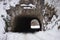 Tunnel in mountain covered in snow