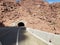 Tunnel mountain road route asphalt curve desert