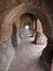 A tunnel view of wonderful arches ancient artworks of Terracotta in Bishnupur, West Bengal, India