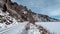 Tunnels and bridges winter circum-Baikal railway at the foot of the mountains on the coast of Lake Baikal, Siberia